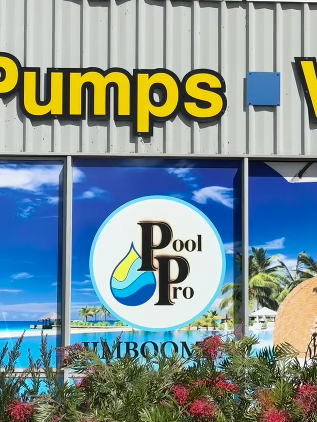 The Pool Pro Jimboomba shopfront window at 15–17 Tamborine Street, with the Pool Pro logo across the glass.